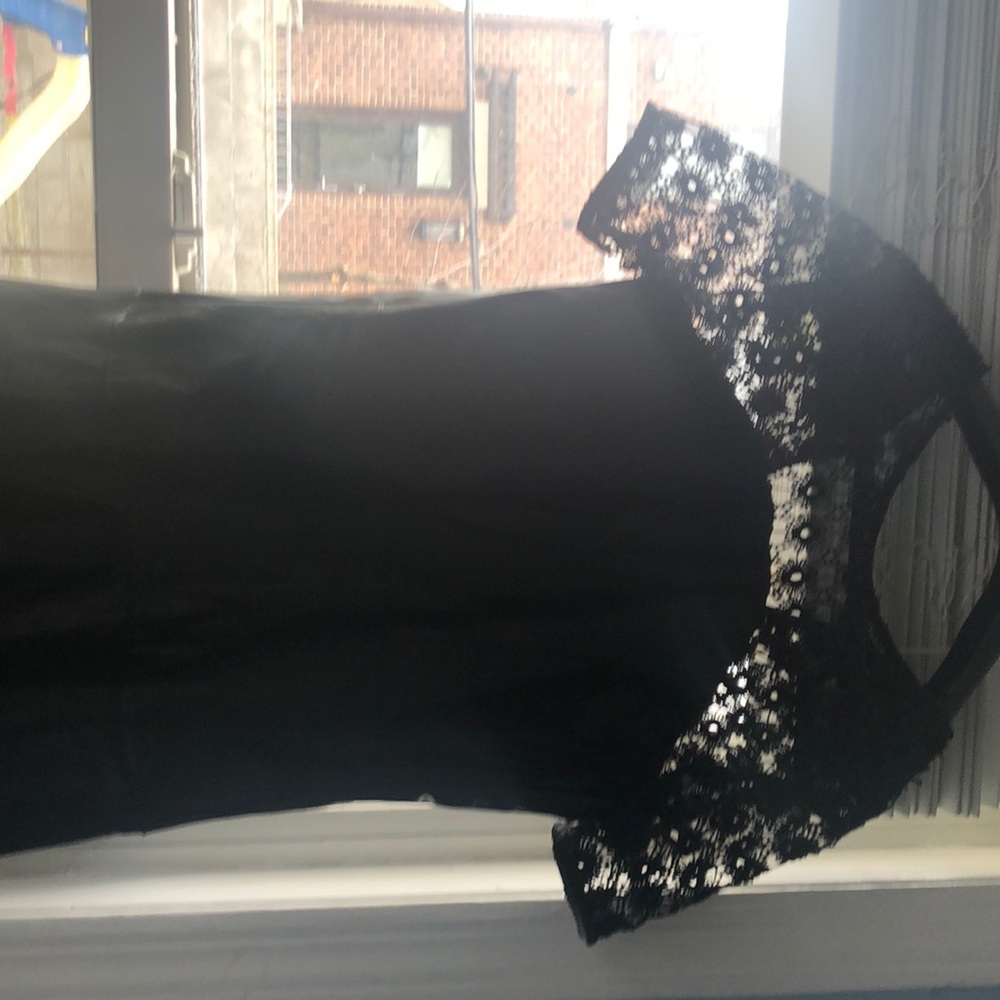 Leather dress size 14 perfect for a petite girl not necessarily for a young girl